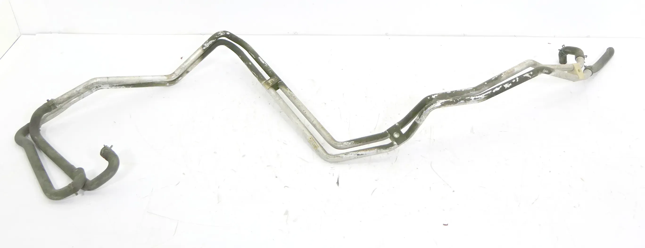 VW T4 Leitung Kühlwasser Kühlflüssigkeit unterm Auto nach hinten 701819885C - Bild 1